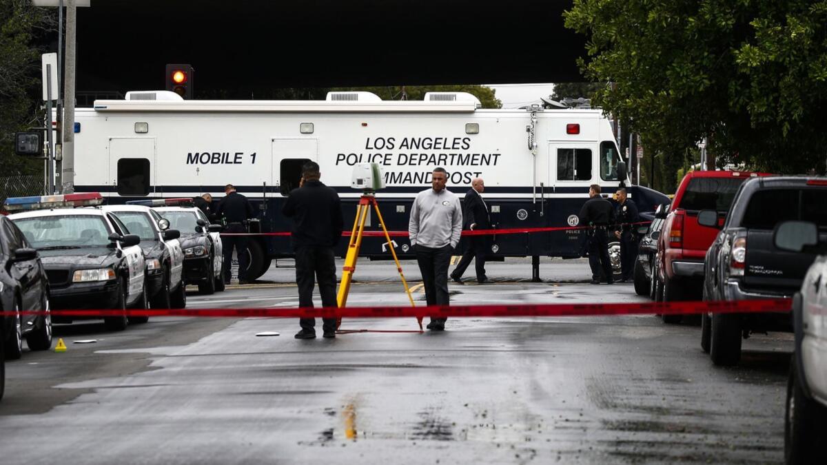 Police Officers at the scene of a fatal officer involved shooting near the 10900 block of Telfair Avenue in Pacoima.