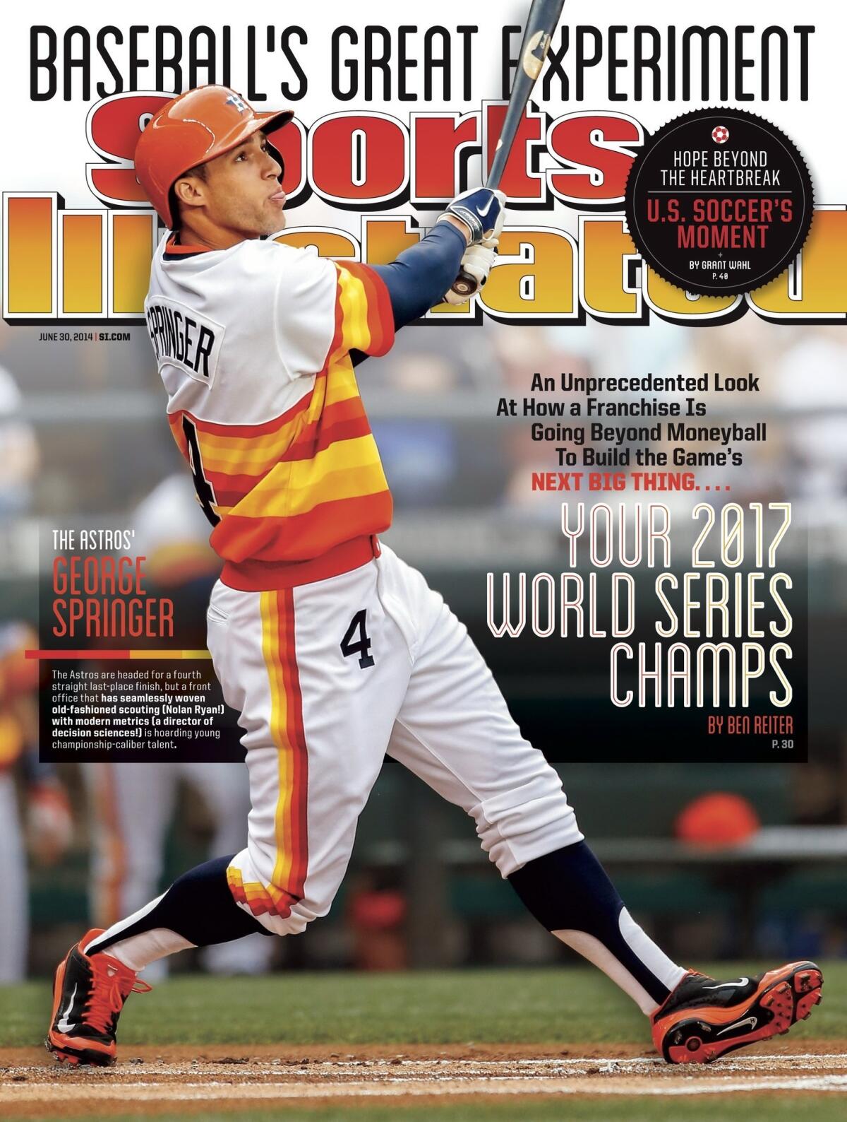 The cover Sports Illustrated ran in June 2014 predicting the Houston Astros would win the 2017 World Series shows George Springer at bat.