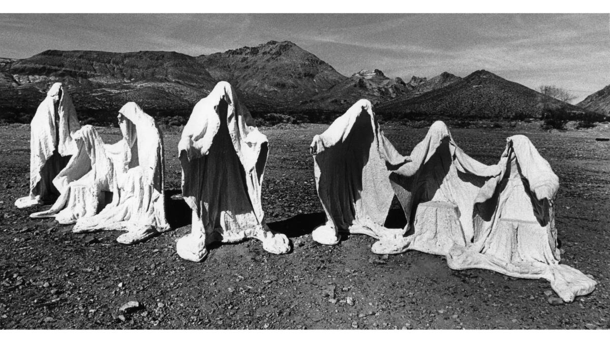 Feb. 4, 1986: Seven fiberglass "ghosts" decorate the landscape at the ghost town of Rhyolite, Nev. The sculptures first appeared on halloween 1984.