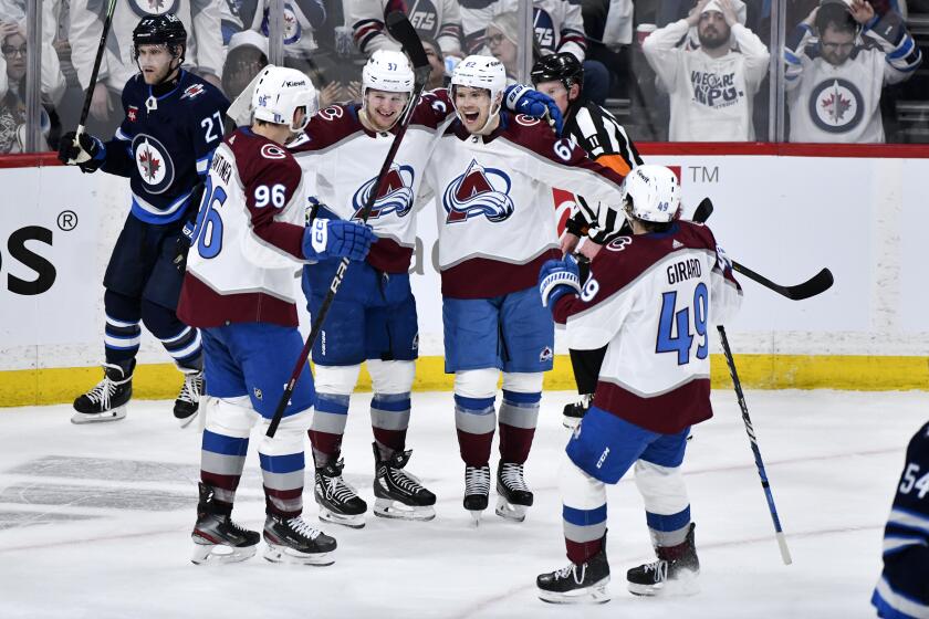 Colorado Avalanche Artturi Lehkonen (62) celebrates his goal against the Winnipeg Jets with Mikko Rantanen (96), Casey Mittelstadt (37) and Samuel Girard (49) during the second period in Game 5 of an NHL hockey Stanley Cup first-round playoff series in Winnipeg, Manitoba, Tuesday, April 30, 2024. (Fred Greenslade/The Canadian Press via AP)