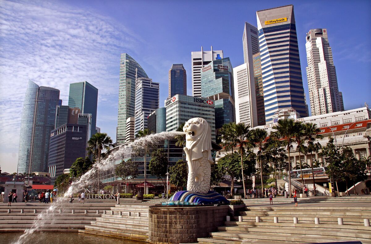 Water streams from the Merlion, Singapore's mythical mascot, in a park near the central business district. 