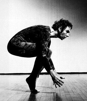 runtime:topic id="PEHST000502">Merce Cunningham crouches as part of a dance in 1973. Beginning in the 1970s, Cunningham worked extensively on dance-for-camera projects, often in collaboration with Elliot Caplan and Charles Atlas.