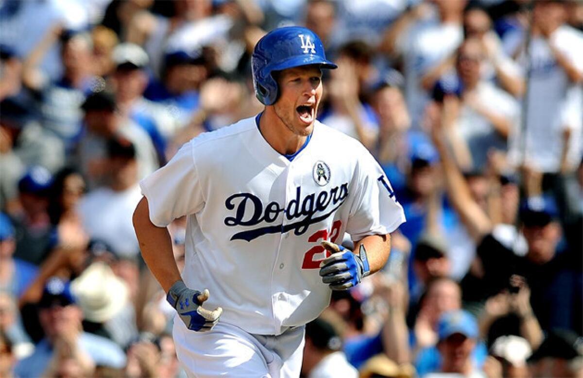 Dodgers pitcher Clayton Kershaw celebrates his home run in the eighth inning against the Giants.