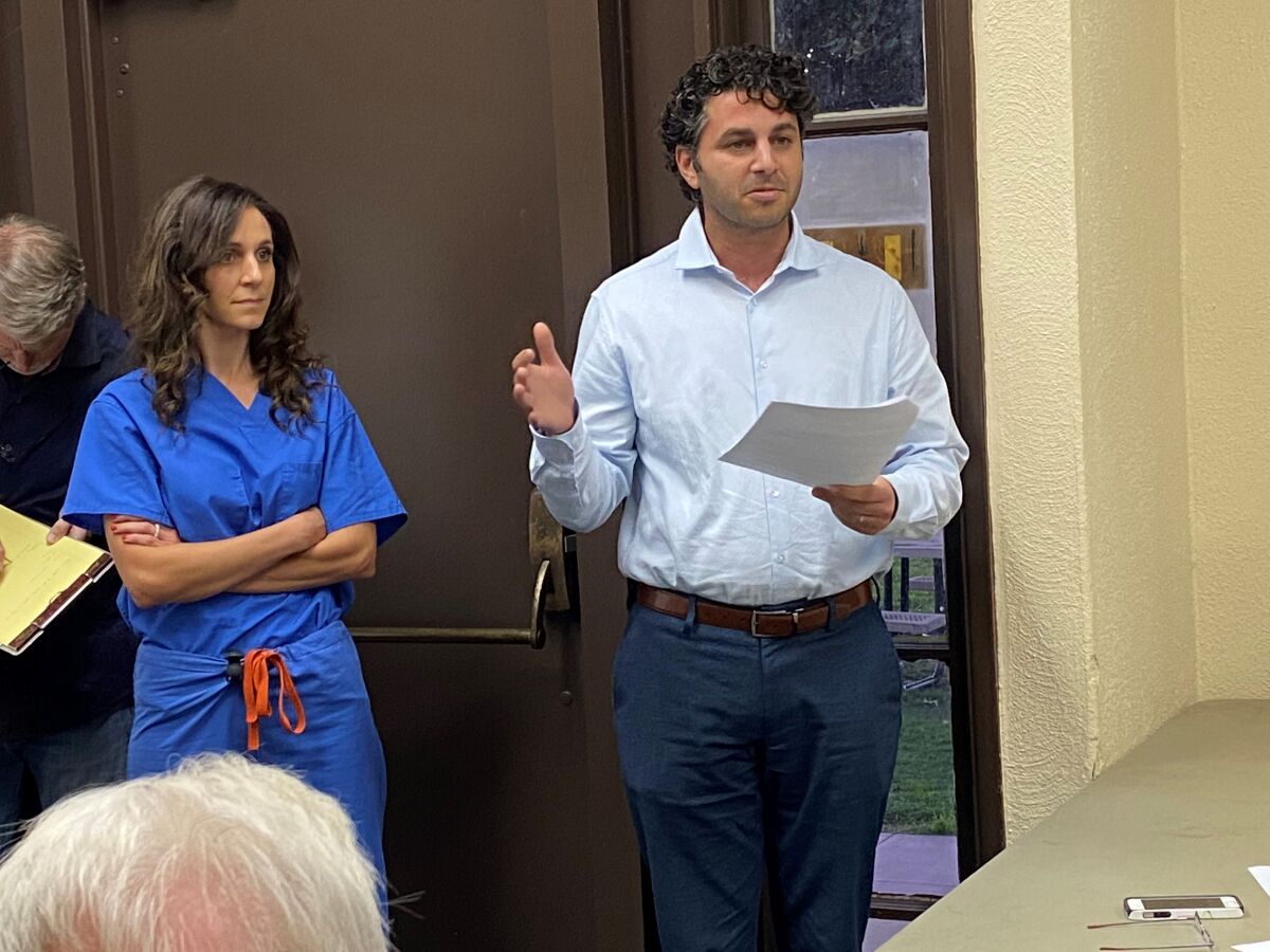 La Jolla Shores residents Engy and Bishoy Said face questions from neighbors about a proposed companion unit, during the La Jolla Shores Permit Review Committee meeting Dec. 16.