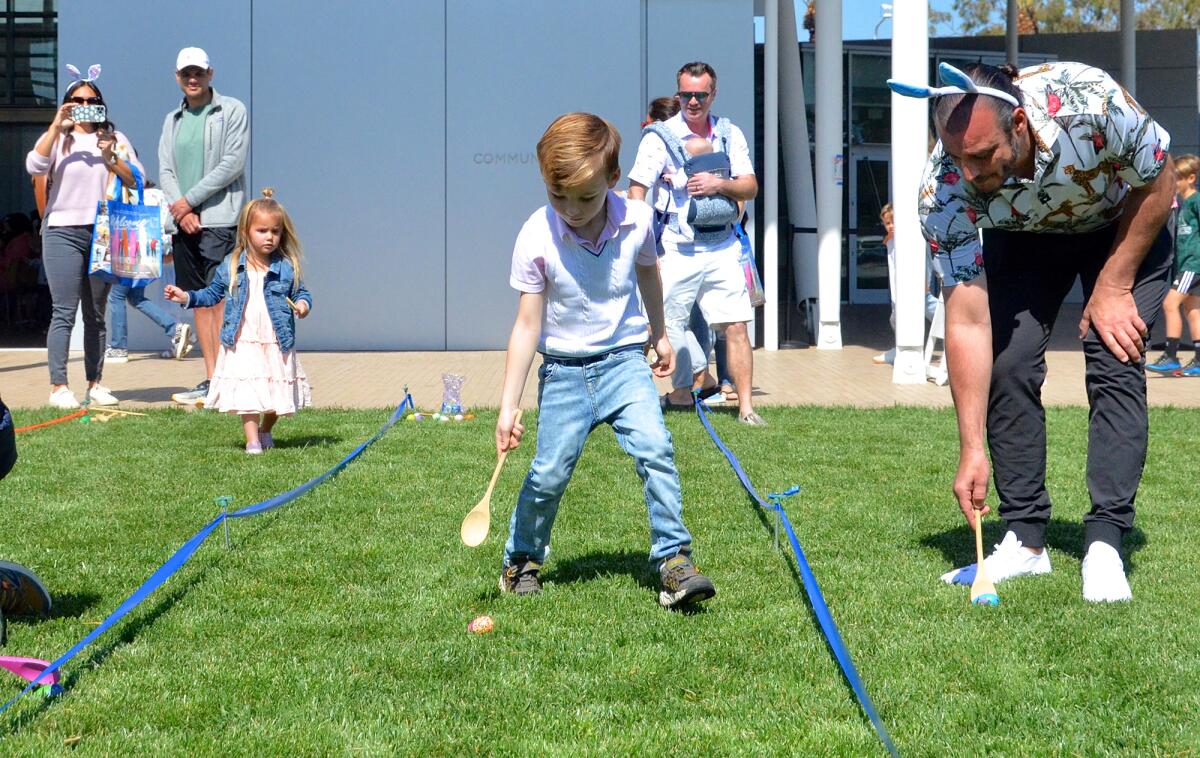 Mayor Noah Blom challenged kids during the eighth annual Mayor's Egg Race, held April 1 at Newport Beach Civic Center. 