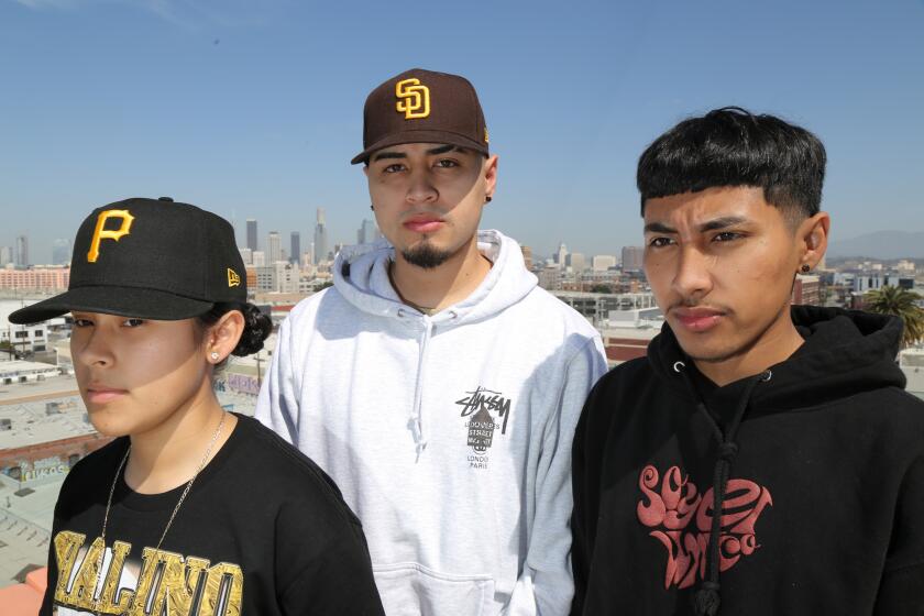 LOS ANGELES, CA - APRIL, 18, 2022: Yahritza, Mando and Jairo Martinez hanging out at SoHo Warehouse in Downtown, Los Angeles on April 18th, 2022. The trio, led by Yahritza, age 15, have a band called Yahritza Y Su Esencia, whose song, Soy El Unico recently went viral, shooting them to the No. 1 Spot of the Hot Latin Songs Billboard Chart.