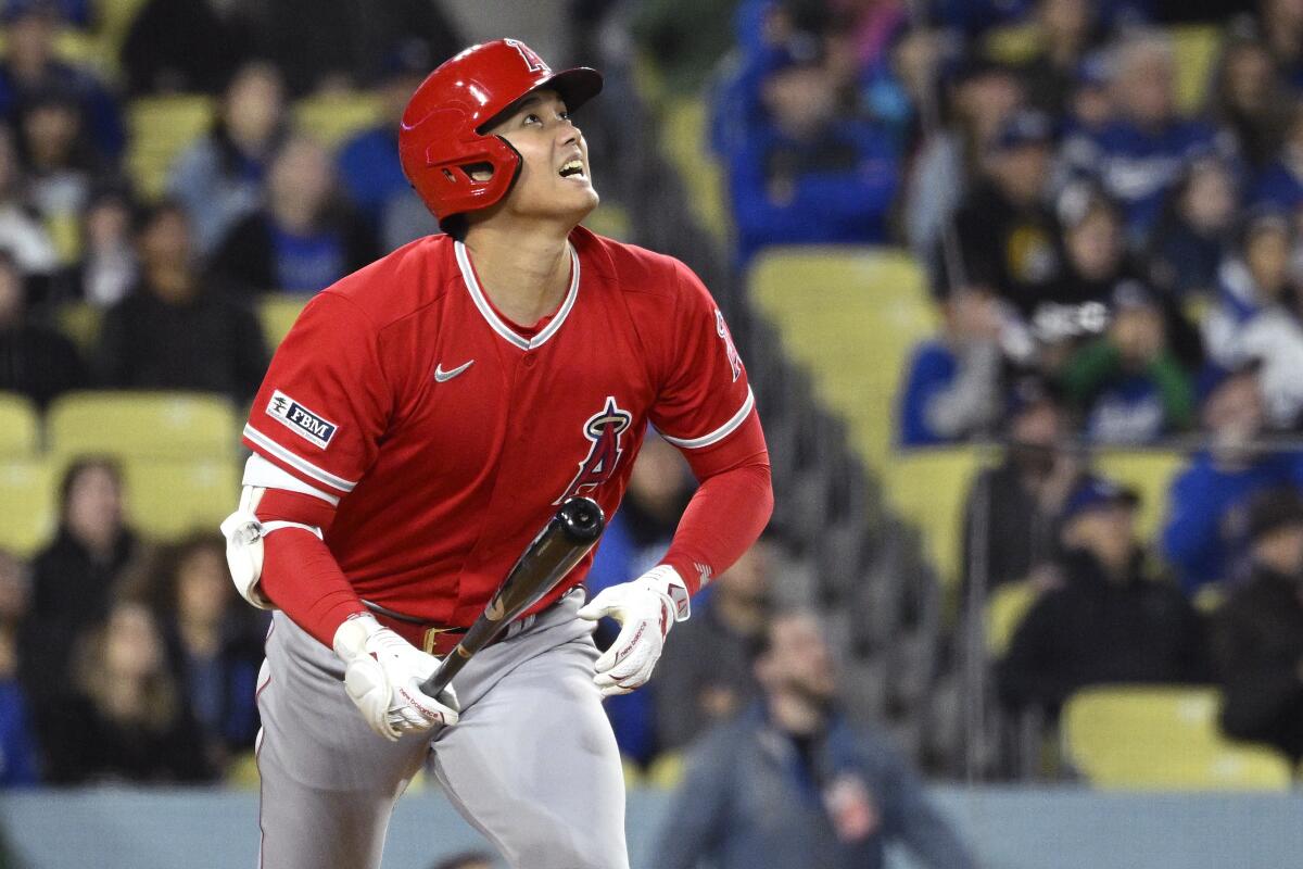 Angels star Shohei Ohtani runs to first as he flies out against the Dodgers
