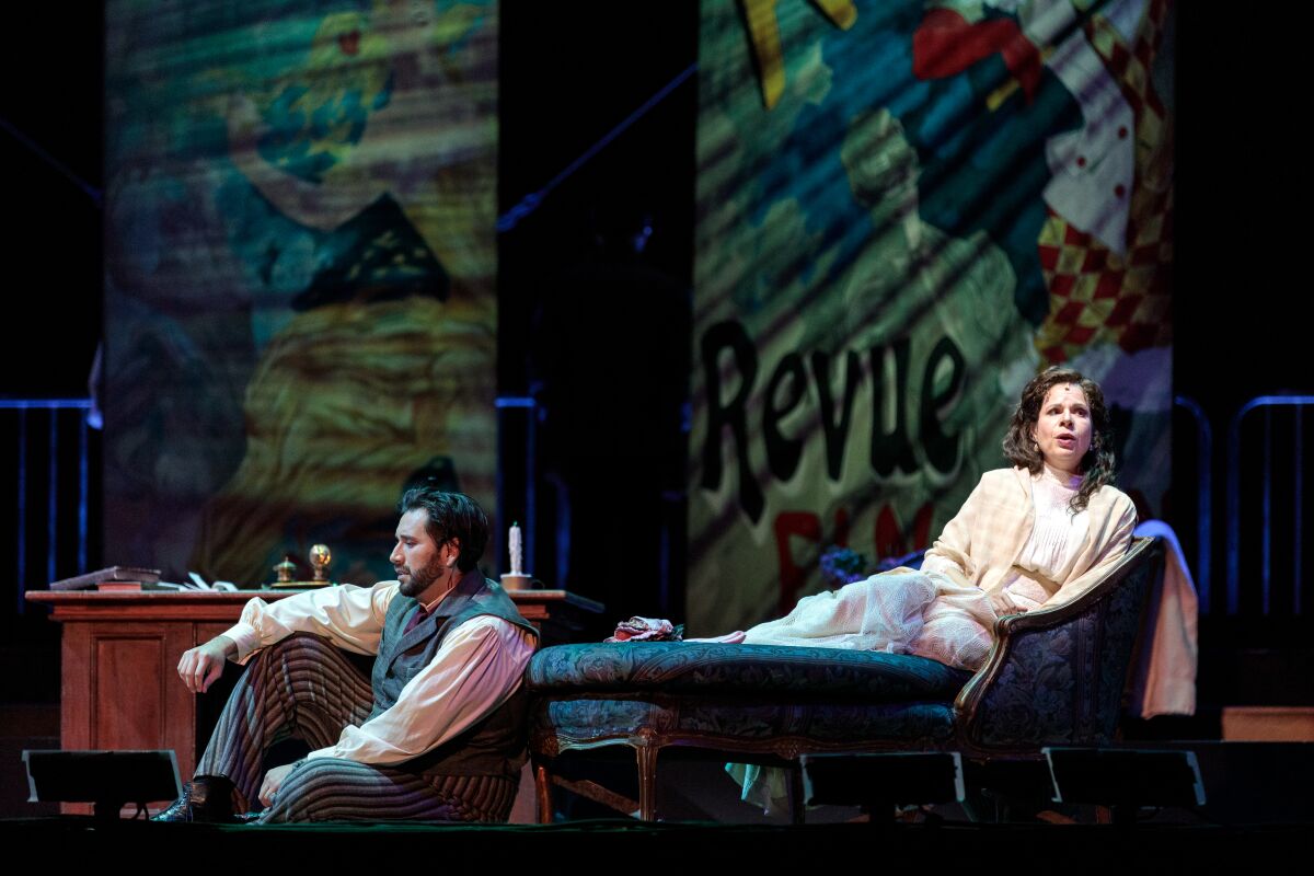 Tenor Joshua Guerrero is Rodolfo and soprano Ana Maria Martinez is Mimi in San Diego Opera's drive-in La bohème."
