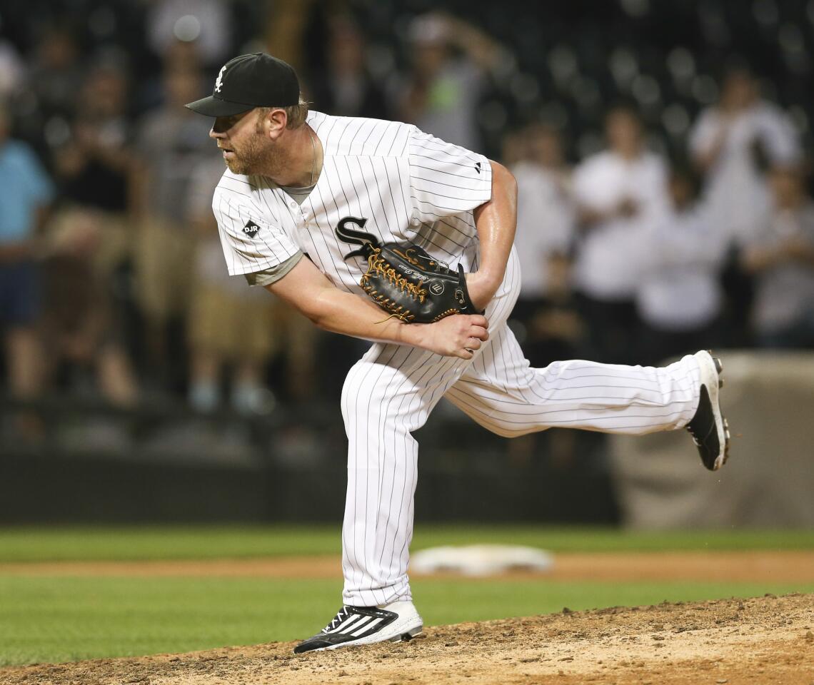 Adam Dunn came in as a relief pitcher during the ninth inning against the Rangers.