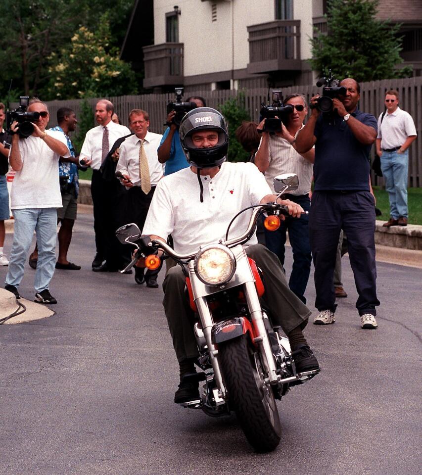 Phil Jackson leaves the Berto Center in Deerfield on his motocycle after cleaning out his office. He said he will not return as Chicago Bulls head coach next year.
