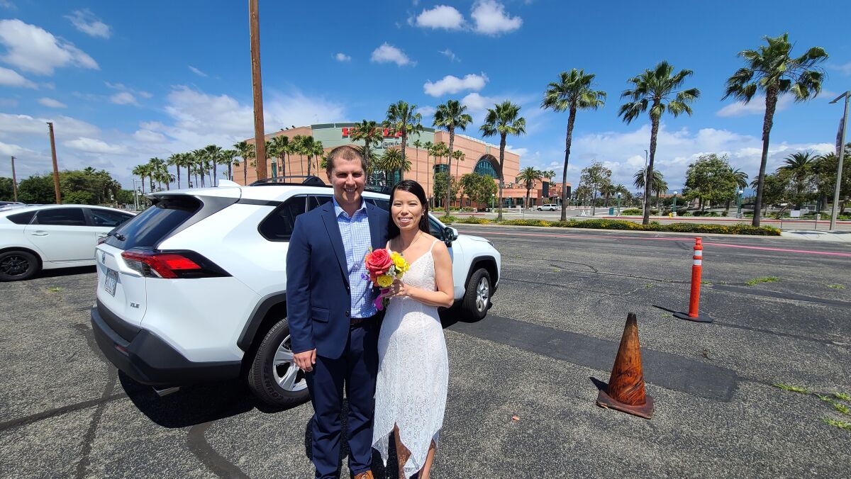 David Steinmetz and Kaitlin Tran were supposed to get married at the Oak Canyon Nature Center, but it got canceled. Instead, they got married at the Honda Center, where the O.C. Clerk-Recorder opened up marriage services on Friday.