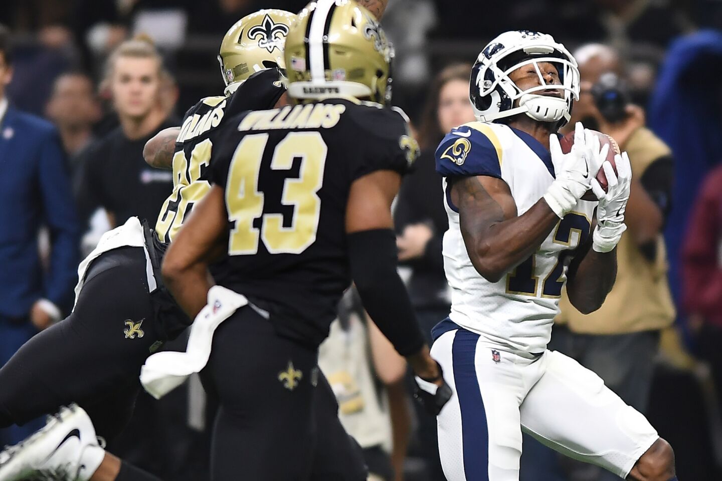 Rams receiver Brandin Cooks makes a catch against the Saints defense to set up a touchdown late in the second quarter in the NFC Championship at the Superdome on Jan. 20.