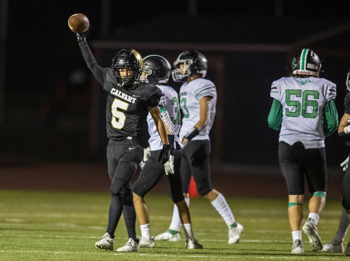 Calvary Chapel's Luke Huffman celebrates after making a reception during an Orange Coast League game against Costa Mesa.