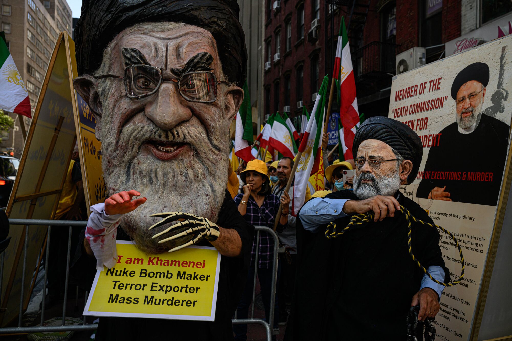 Protesters attend a rally calling for the prosecution of the Irans President Ebrahim Raisi