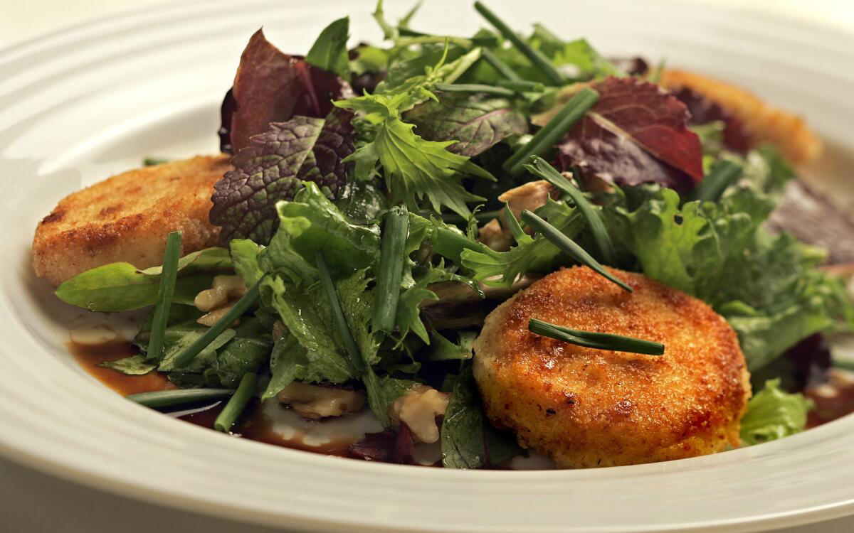 Pan-fried goat cheese salad with hazelnut vinaigrette