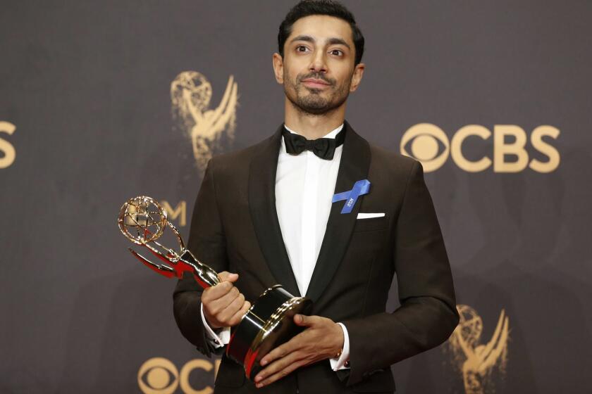 LOS ANGELES, CA., September 17, 2017: Actor Riz Ahmed accepts the Outstanding Lead Actor in a Limited Series or Movie award for ' The Night Of ' in the Trophy Room at the 69th Emmy Awards at the Microsoft Theater in Los Angeles, CA., Sunday, September 17, 2017. (Allen J. Schaben / Los Angeles Times)