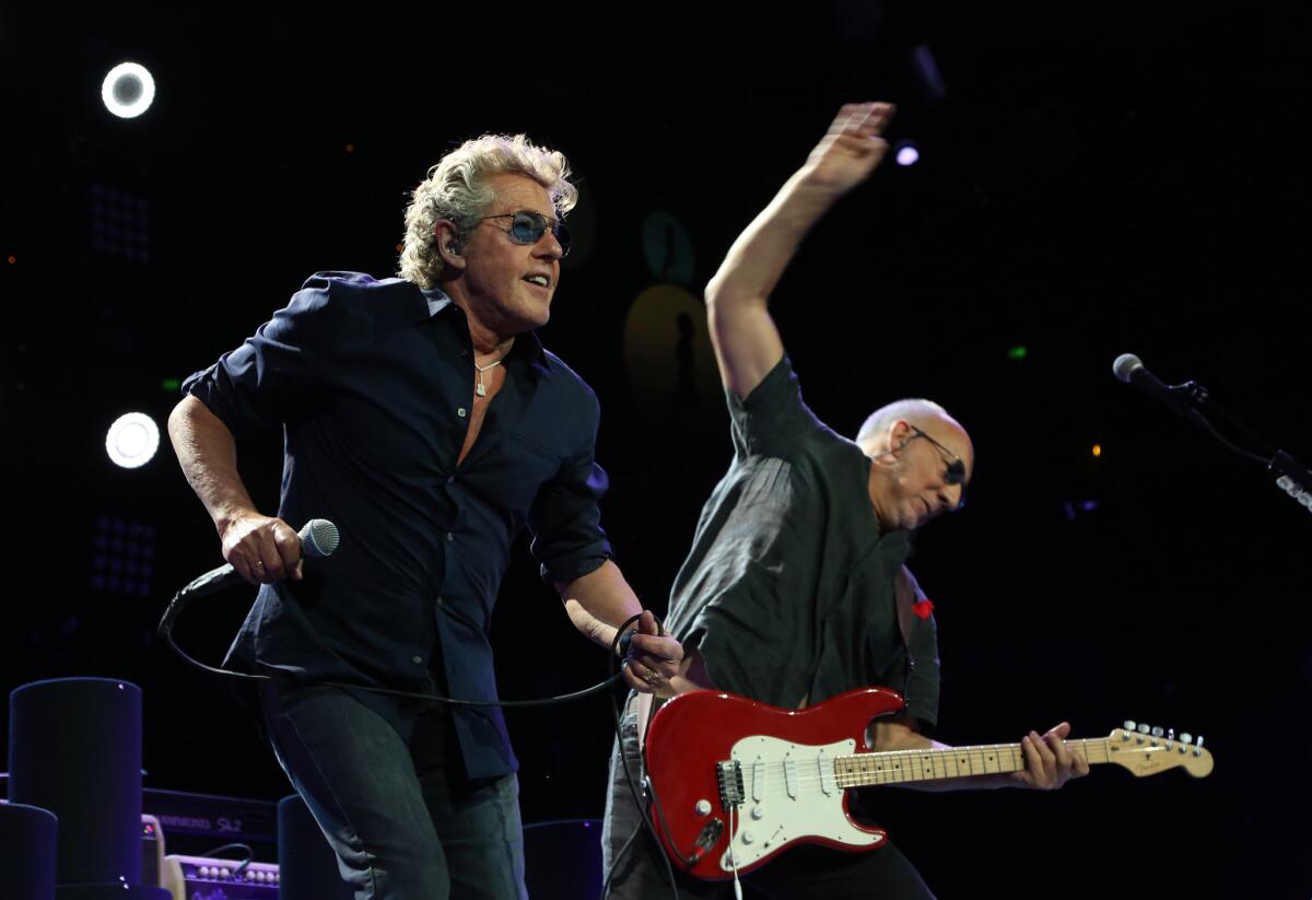 Surviving founding members of the Who -- lead singer Roger Daltrey, left, and lead guitarist-songwriter Pete Townshend -- perform at the Honda Center in Anaheim. The band plays Wednesday at L.A.'s Staples Center.