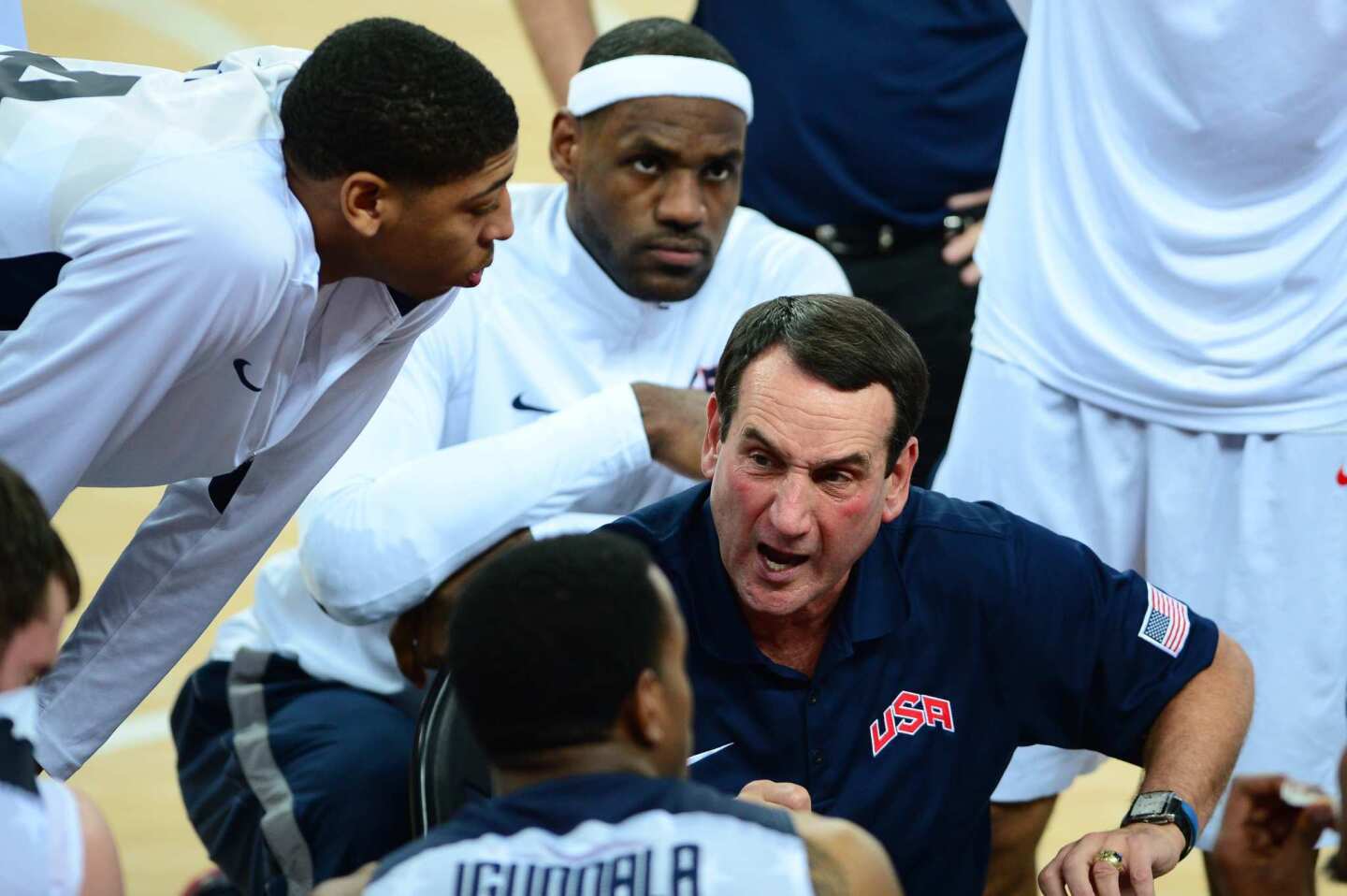 U.S. coach Michael Krzyzewski gives his team instructions during the men's final basketball game at the 2012 London Olympics.