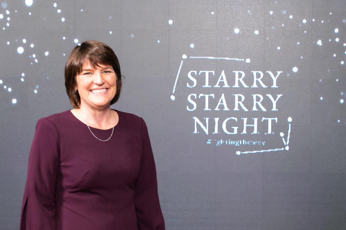 Voices for Children President and CEO Kelly Capen Douglas