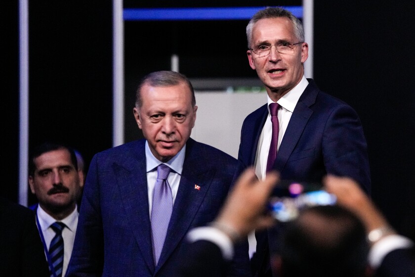 Recep Tayyip Erdogan, second from left, and Jens Stoltenberg, right 