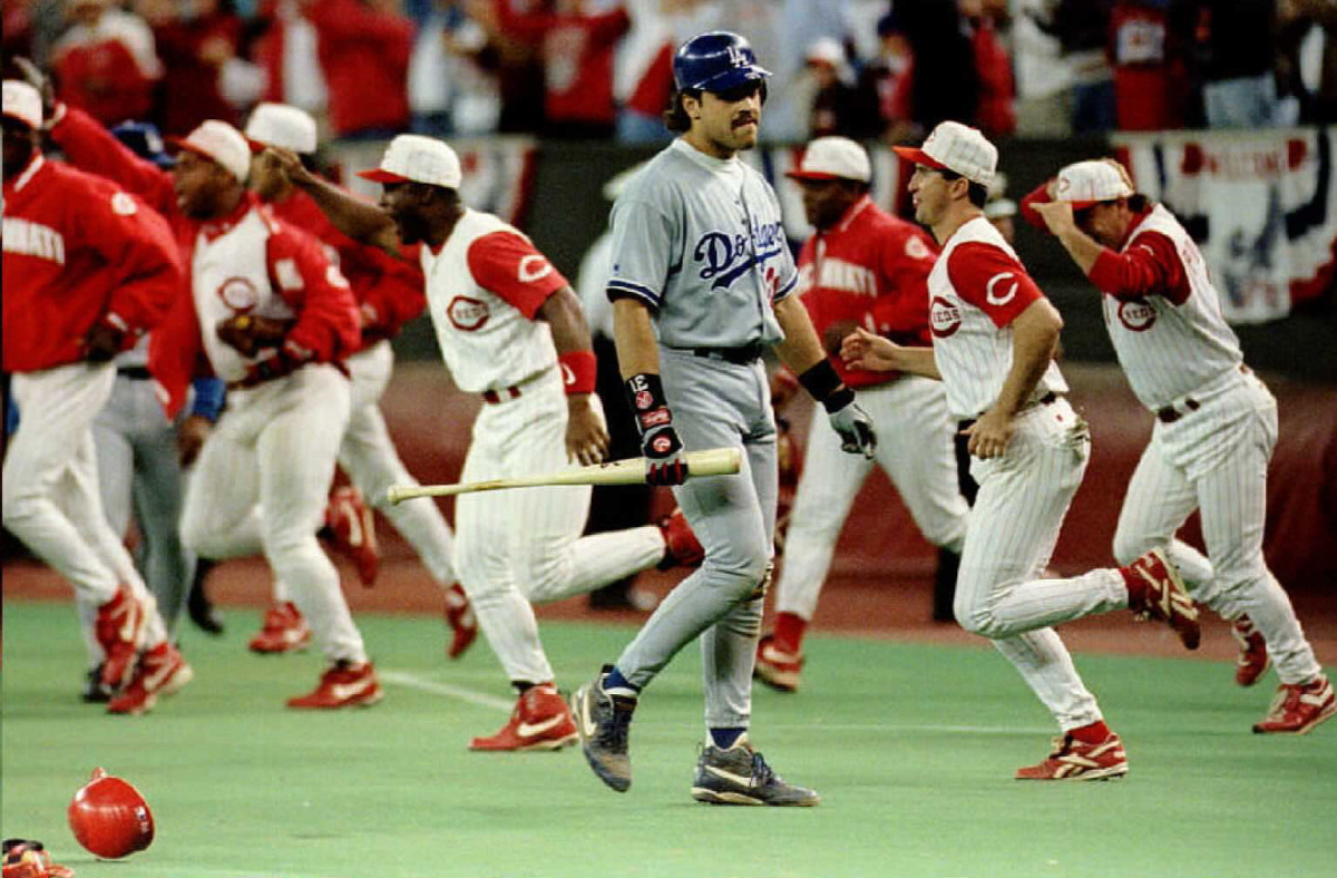 Dodgers catcher Mike Piazza walks off the field after flying out to end Game 3 of the 1995 NLDS.