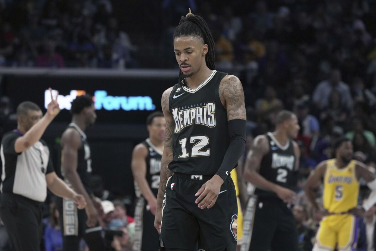 Memphis Grizzlies Ja Morant heads up court in the first half against the Lakers.