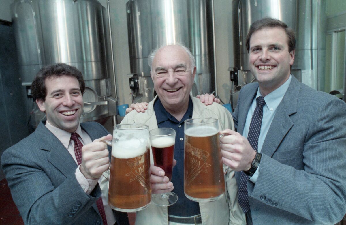 Matt Rattner, from left, Karl Strauss and Chris Cramer share a brew 