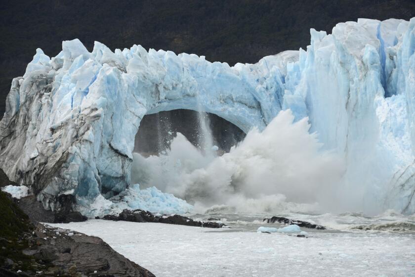 FILE - Chunks of ice break off the Perito Moreno Glacier, in Lake Argentina, at Los Glaciares National Park, near El Calafate, in Argentina's Patagonia region, March 10, 2016. As glaciers melt and pour massive amounts of water into nearby lakes, 15 million people across the globe live under the threat of a sudden and deadly outburst flood, a new study finds. (AP Photo/Francisco Munoz, File)