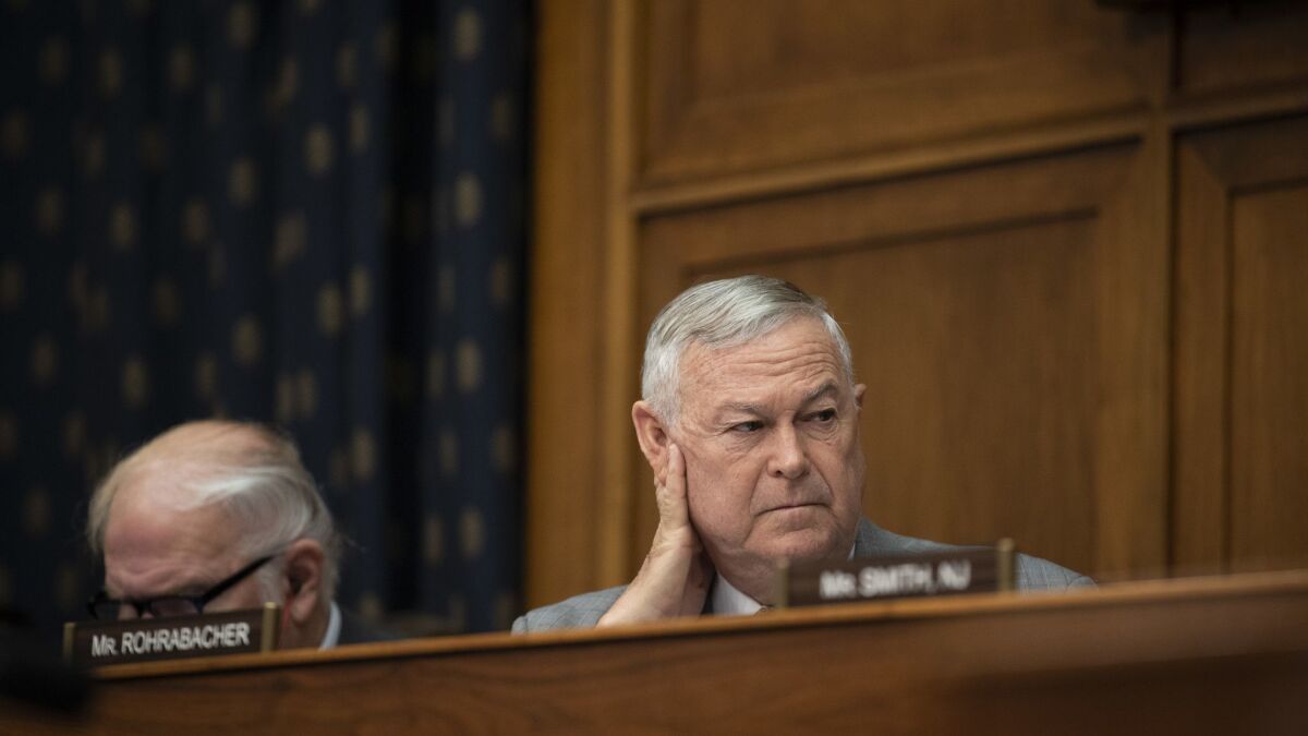 Rep. Dana Rohrabacher listens during a House Foreign Affairs Committee hearing concerning the genocide against the Burmese Rohingya, on Capitol Hill, September 26, 2018.