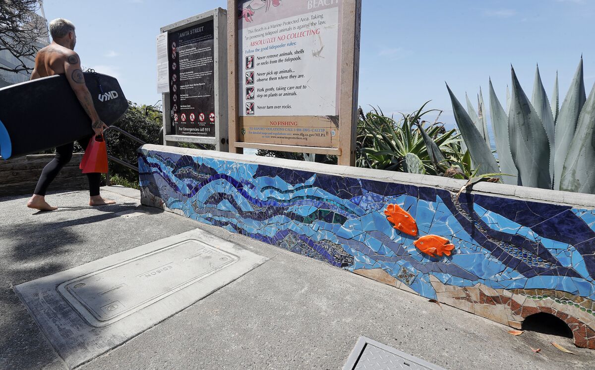 The "Water Wall" mural is set to be removed from the beach access stairs at Anita Street Beach.