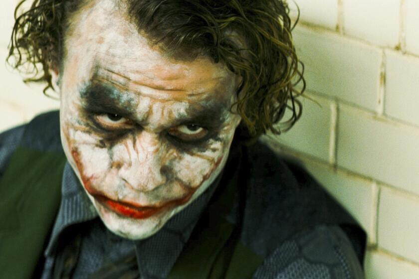HEATH LEDGER stars as The Joker in Warner Bros. Pictures and Legendary Pictures action drama movie The Dark Knight, distributed by Warner Bros. Pictures and also starring Christian Bale, Michael Caine, Gary Oldman, Aaron Eckhart, Maggie Gyllenhaal and Morgan Freeman.