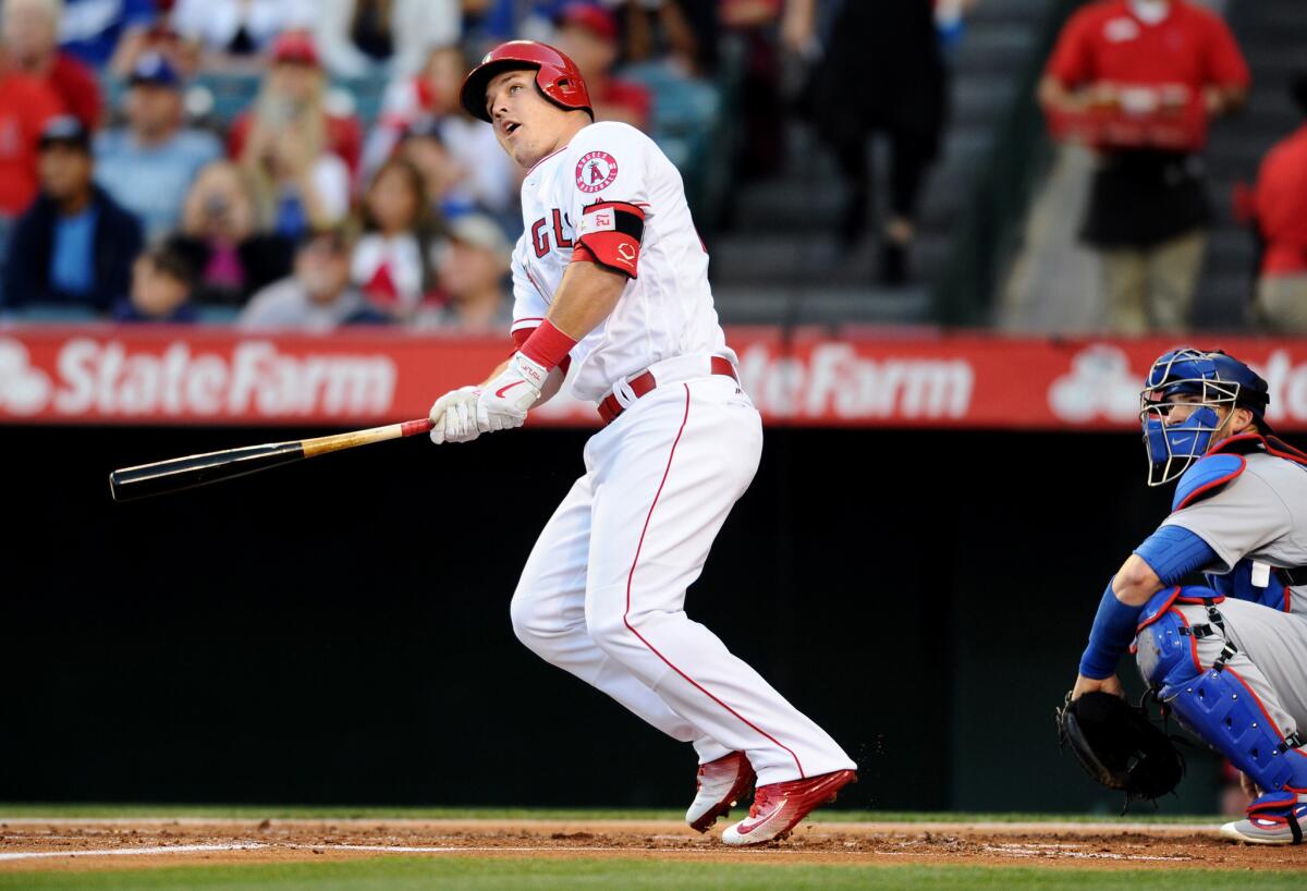 How fast can the Angels become a contender while Mike Trout, watching a home run against the Dodgers in May, is still the best player in baseball?