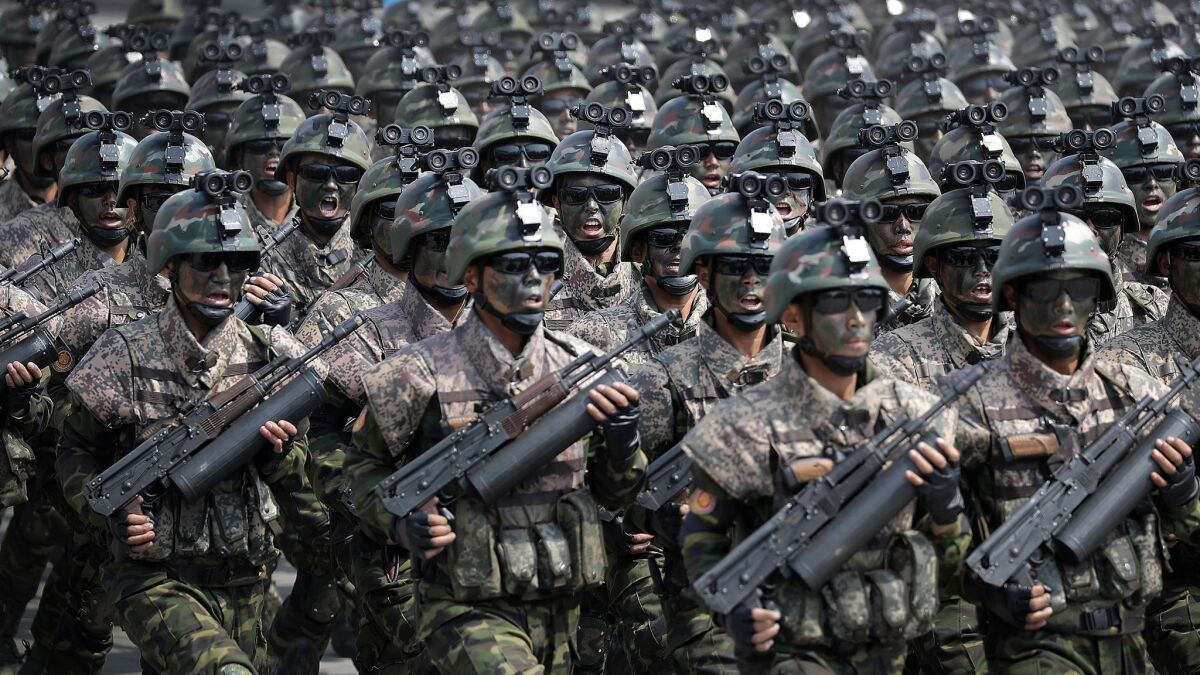 Commandos march across Kim Il Sung Square during a military parade in Pyongyang, North Korea.