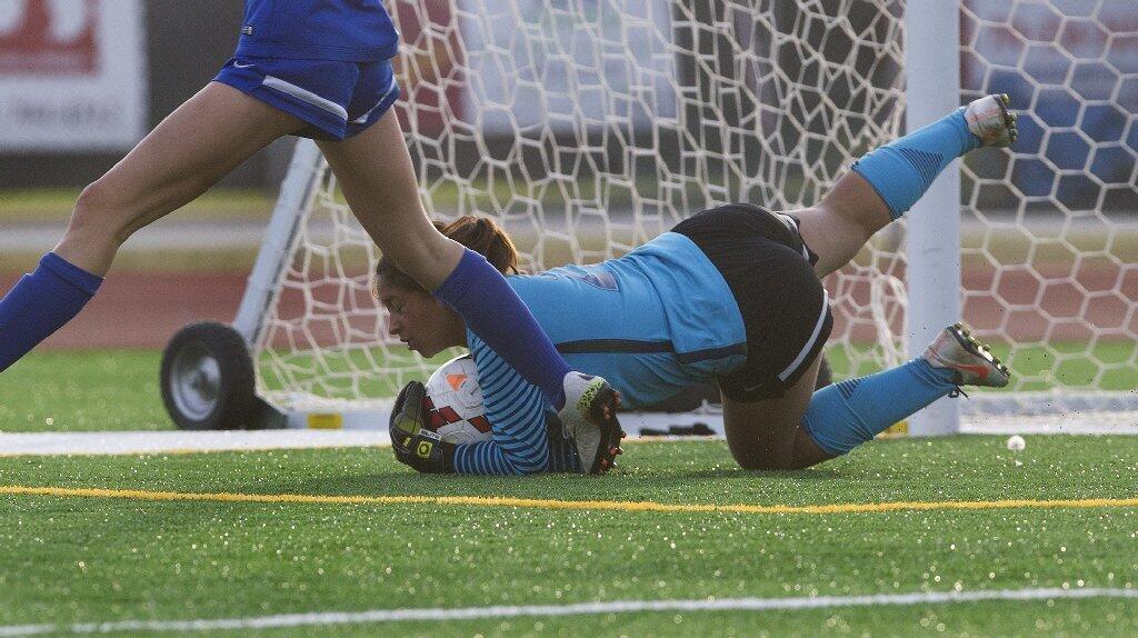 Ocean View High goalie Jasmine Rocha makes a save during the first half against Fountain Valley.