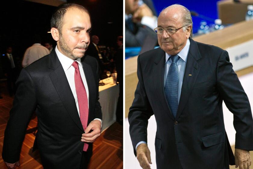 Jordanian Prince Ali bin al-Hussein, left, and FIFA President Sepp Blatter.