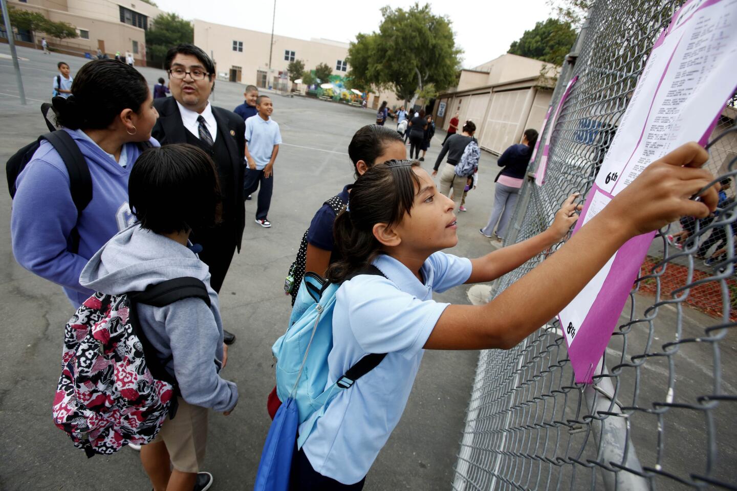 Seventh-grader Jessica Serrano checks for her class at Utah Street School in Boyle Heights.