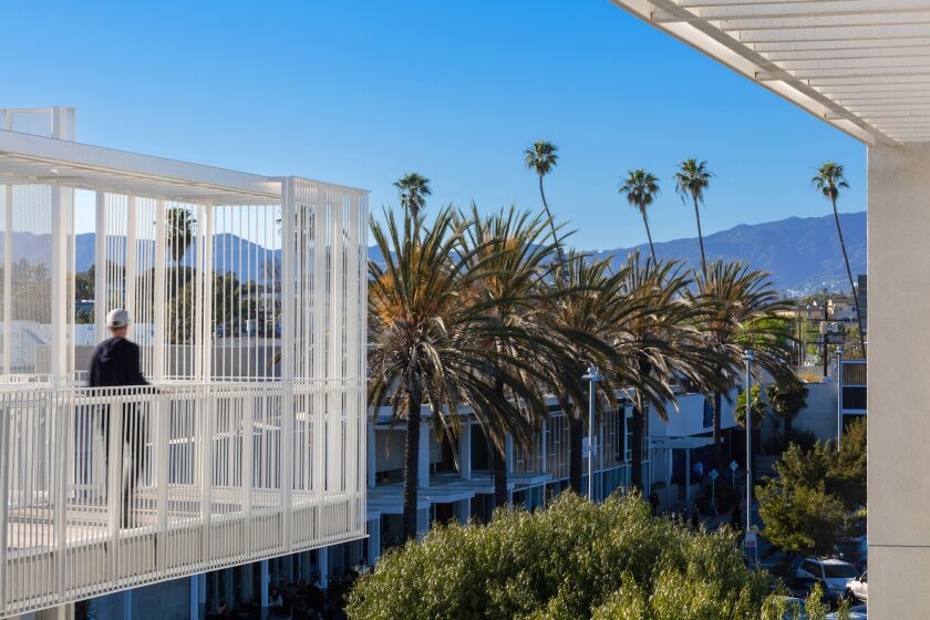 A view from a rooftop terrace at the Rose Apartments in Venice, designed by Brooks + Scarpa (Angela Brooks and Lawrence Scarpa), bring density, passive ventilation, outdoor space and affordable housing to a small lot in Venice.