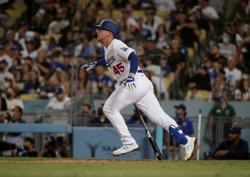 The Dodgers' Matt Beaty watches his go-ahead home run in the seventh inning Oct. 1, 2021.