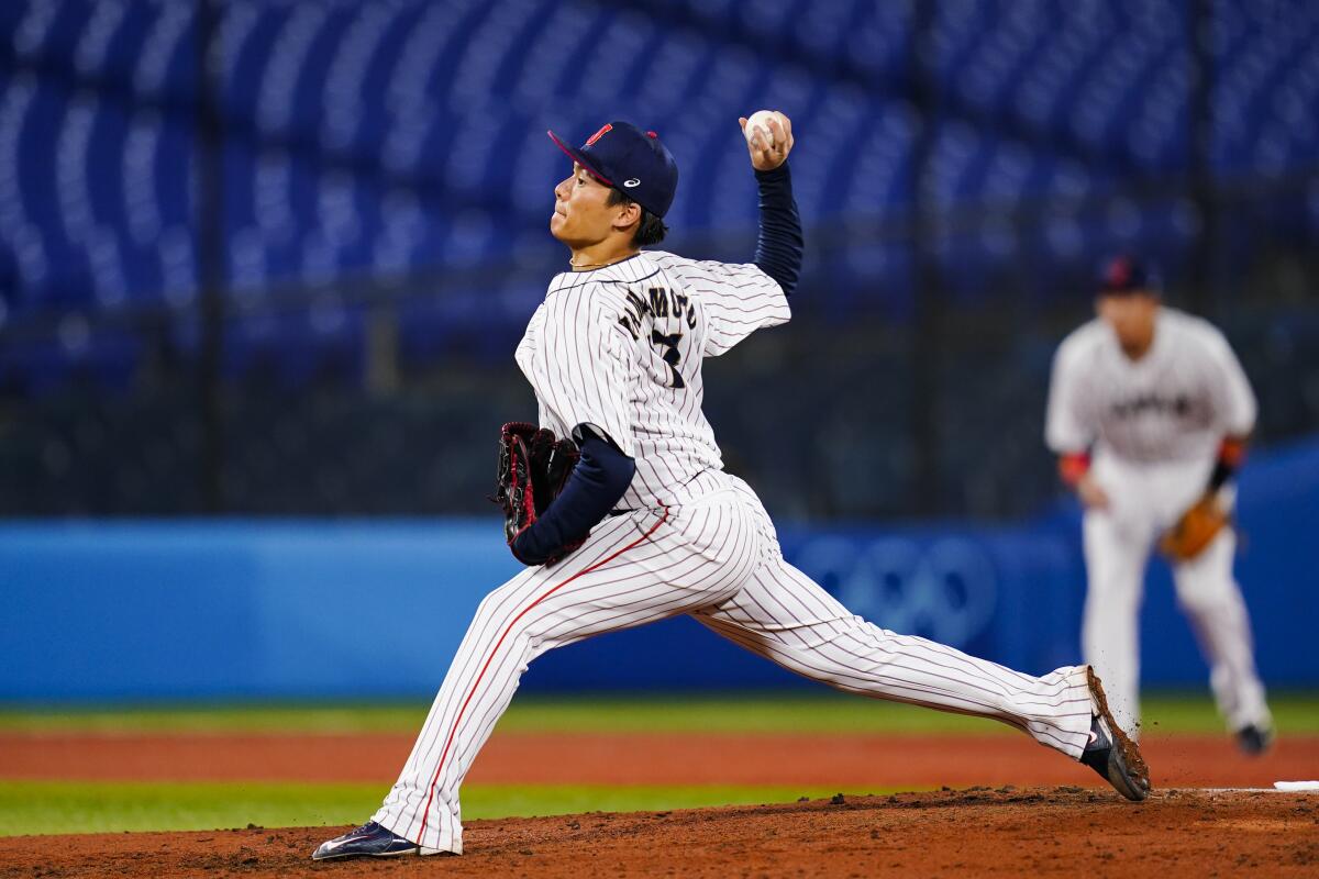 Yoshinobu Yamamoto delivers during a game between Japan and South Korea during the Tokyo Olympic Games in August 2021.