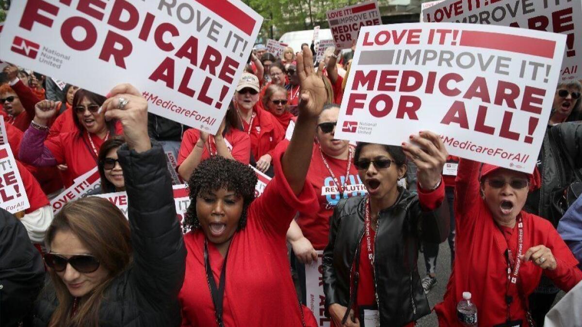 Demonstrators rally in support of single-payer healthcare in Washington on April 29.