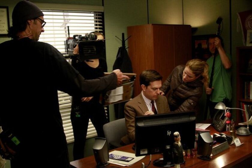 "The Office" will cap its nine-season run on NBC in May with a one-hour farewell. Ed Helms is prepped for a shoot.