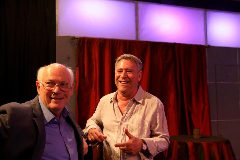 VENICE, CA - NOVEMBER 10, 2018 - - Playwright Joe Gilford, right, and director Michael Pressman work together on the production of, "Finks," at The Electric Lodge in Venice on November 10, 2018. The play, written by Gilford, is about how his parents were blacklisted in Hollywood during the McCarthy era. Pressman's father was also blacklisted at the time. Academy Award nominated actor Jack Gilford is Joe's father. The play also features French Stewart, Valerie Stewart and The Rogue Machine Company. (Genaro Molina/Los Angeles Times)