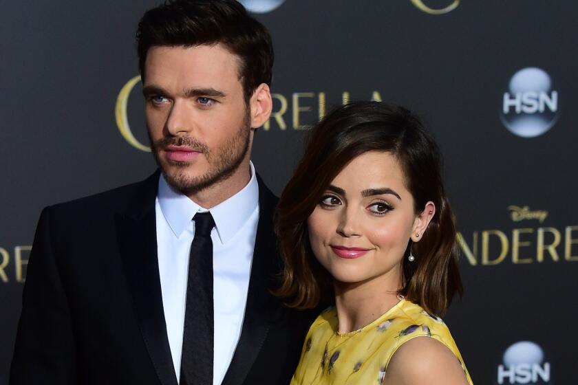Richard Madden and Jenna Coleman attend the Hollywood premiere of Disney's live-action "Cinderella" on March 1, 2015.