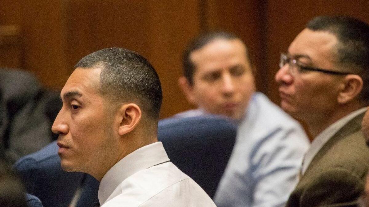 Melvin Sandoval, left, Rogelio Contreras and Santos Grimaldi listen to closing arguments in their trial in the kidnapping and murder of a 13-year-old girl found shot to death in Elysian Park.