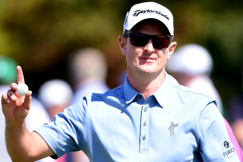 Justin Rose acknowledges the fans after putting for par at No. 18 on Thursday to complete the first round of the Masters.