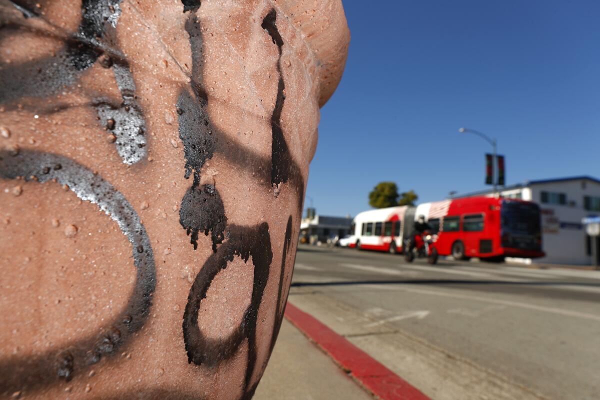 Graffiti covers a concrete planter in City Heights on Thursday, Nov. 12, 2020 in San Diego, CA. 