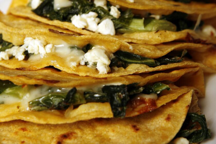 Ho, Lawrence K. -- B58460297Z.1 LOS ANGELES, CA. MAY 27, 2010. Quesadillas with greens and feta cheese. Food shoot in studio on May 27, 2010. (LAWRENCE K. HO/LOS ANGELES TIMES)