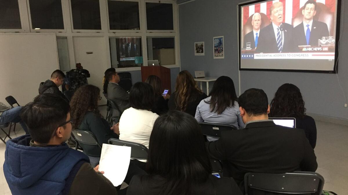 About a dozen people gathered Tuesday at UCLA's Labor Center to watch President Trump's speech to Congress.