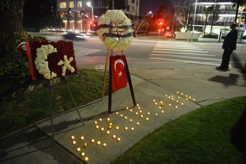 Turkish Consulate staff at a candlelight vigil 