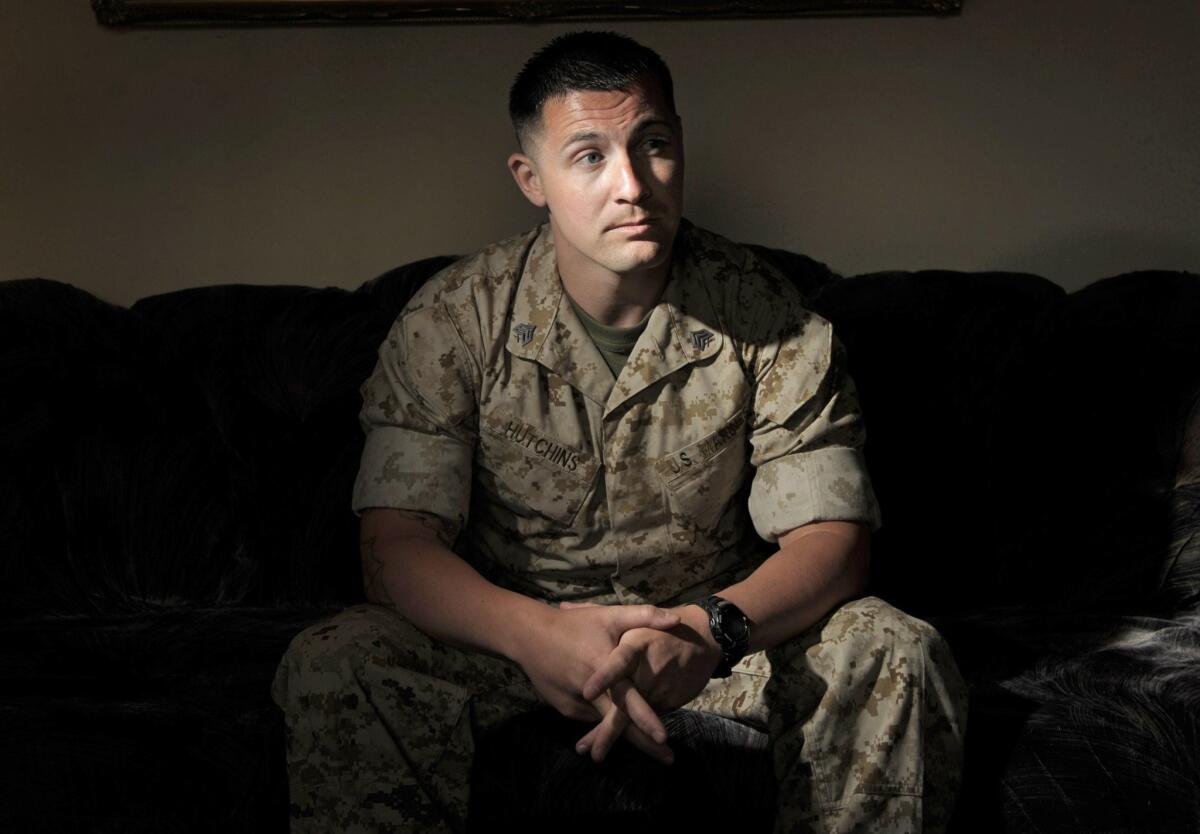 Marine Sgt. Lawrence Hutchins was convicted Wednesday of unpremeditated murder in the 2006 killing of an Iraqi, in a retrial of his 2007 conviction on the same charge.